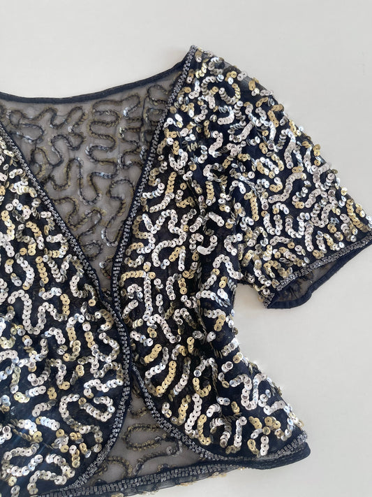 Sequin Shrug-Bust 38